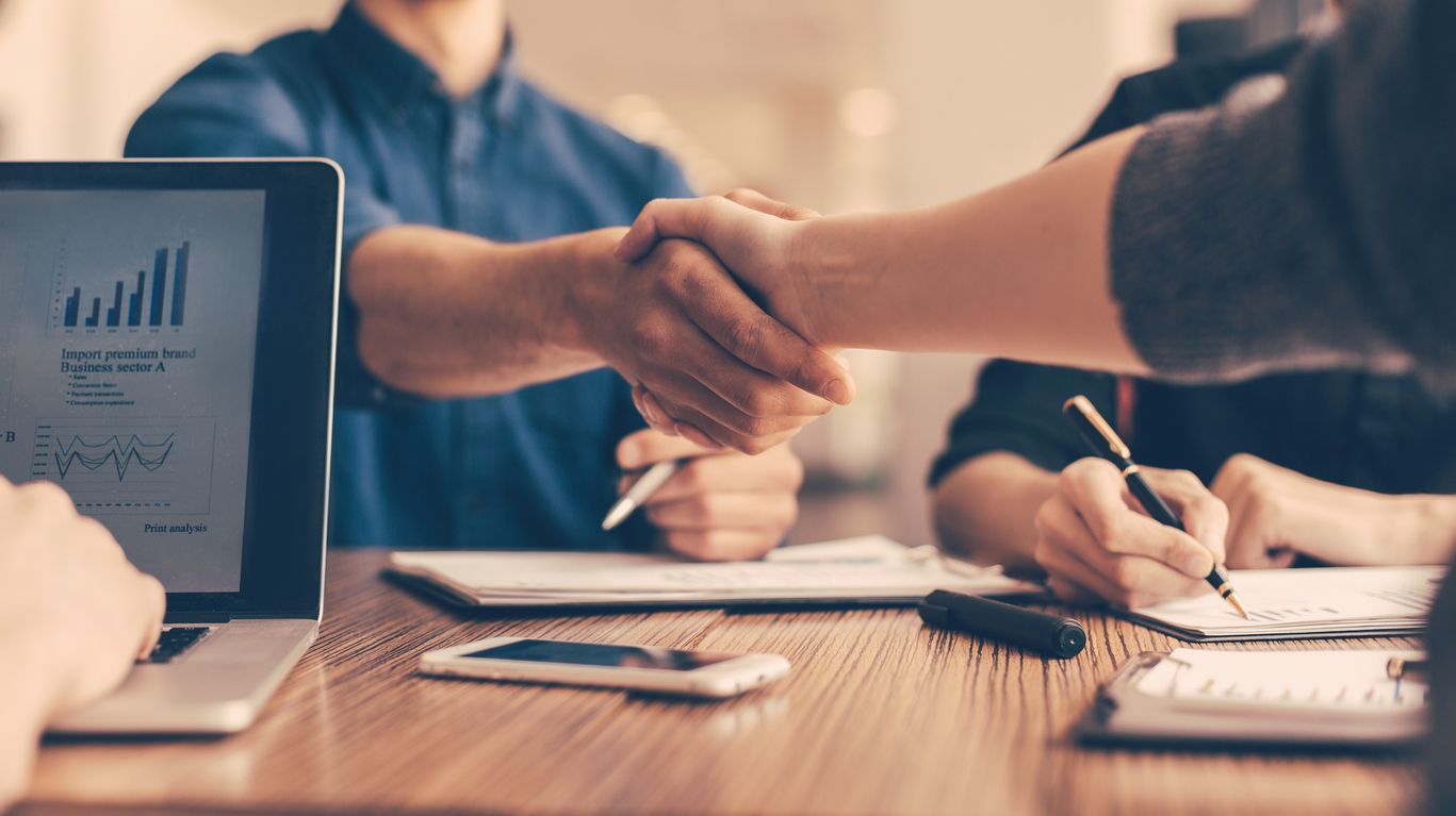 client shaking hand with lender